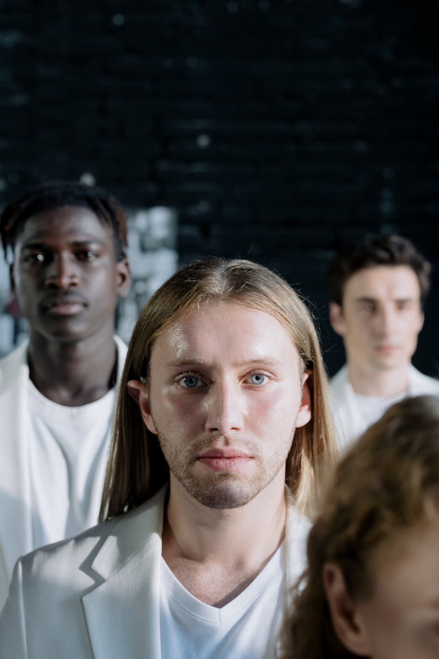 close up of a man in a white outfit